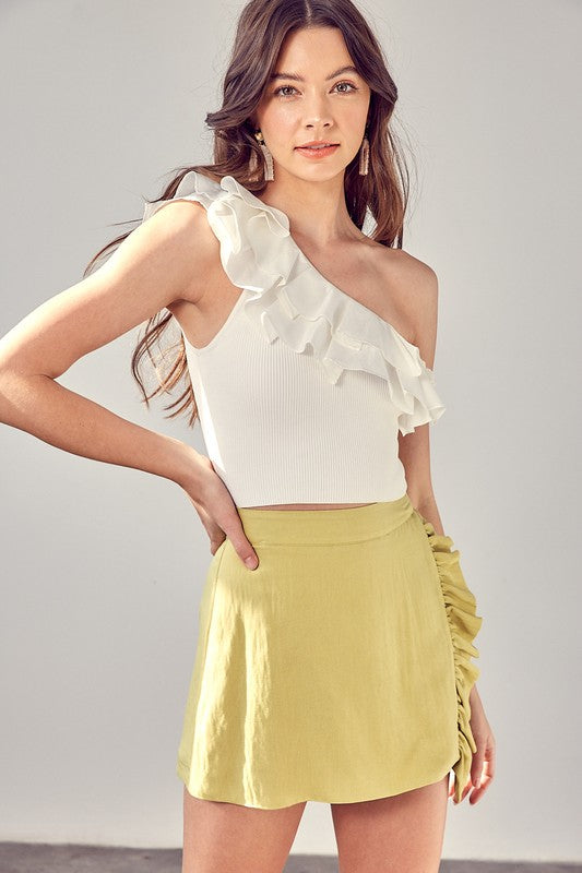 One shoulder knit top with ruffle detail